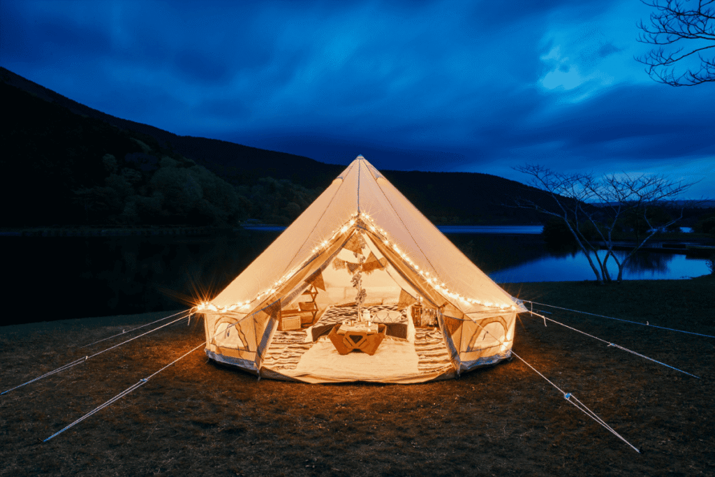 Glamping under night sky with stars